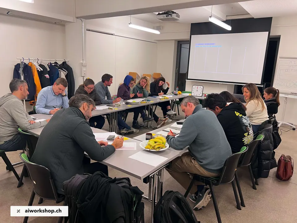 Participants working together during an AI Workshop session in Lausanne
